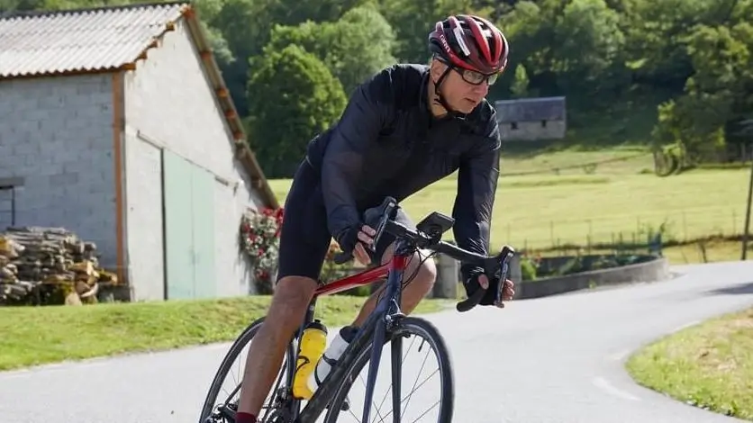 Dr-Nathan-Cycling-e1680539578812 Hills & hair fundraising challenge